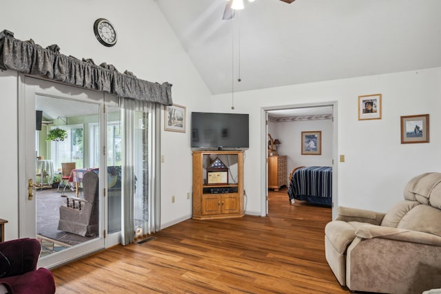 2844 Forage Rd, Shawsville, VA 24162 - living room featuring wood finished floors, ceiling fan, high vaulted ceiling, and baseboards