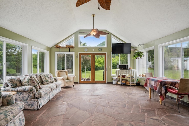2844 Forage Rd, Shawsville, VA 24162 - sunroom with stone finish floors, plenty of natural light, lofted ceiling, french doors, and a textured ceiling