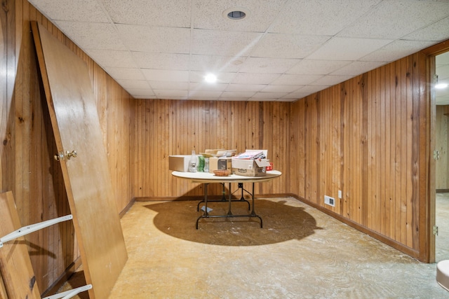2844 Forage Rd, Shawsville, VA 24162 - dining room featuring wood walls, baseboards, and a drop ceiling