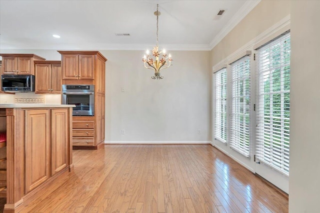 3326 Belshire Ct SW, Roanoke, VA 24014 - kitchen with oven, light countertops, a chandelier, crown molding, and light wood-type flooring