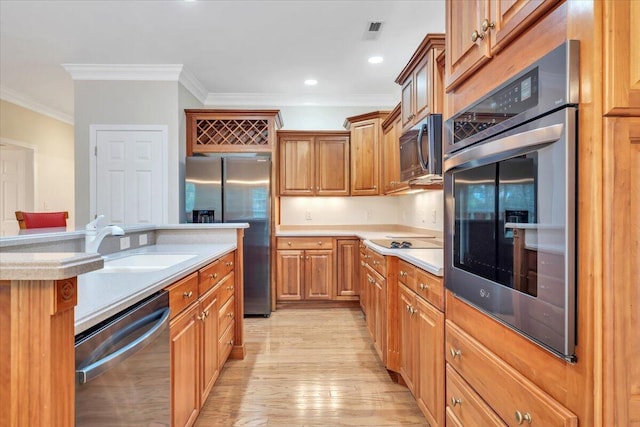 3326 Belshire Ct SW, Roanoke, VA 24014 - kitchen featuring appliances with stainless steel finishes, crown molding, light wood-type flooring, light countertops, and brown cabinetry
