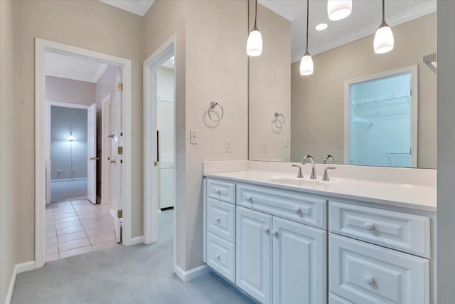 3326 Belshire Ct SW, Roanoke, VA 24014 - bathroom with crown molding, baseboards, vanity, tile patterned flooring, and a spacious closet