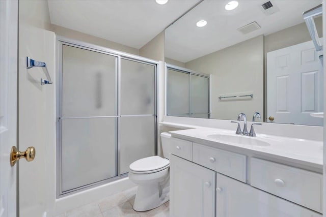3326 Belshire Ct SW, Roanoke, VA 24014 - bathroom with tile patterned flooring, a shower stall, toilet, vanity, and recessed lighting