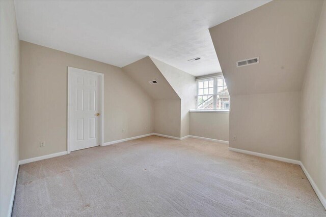 3326 Belshire Ct SW, Roanoke, VA 24014 - additional living space featuring carpet floors, vaulted ceiling, and baseboards