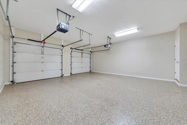 3326 Belshire Ct SW, Roanoke, VA 24014 - garage with a garage door opener and baseboards