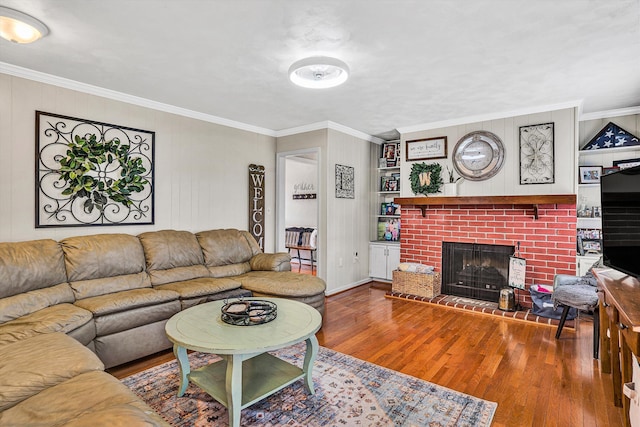 230 Pinehaven Rd, Fincastle, VA 24090 - living room with wood finished floors, a fireplace, ornamental molding, and baseboards