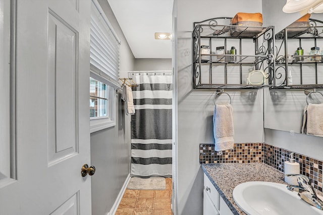 230 Pinehaven Rd, Fincastle, VA 24090 - full bathroom with baseboards, vanity, decorative backsplash, and a shower with shower curtain