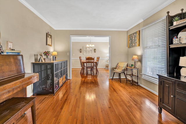 230 Pinehaven Rd, Fincastle, VA 24090 - dining space with light wood finished floors, ornamental molding, a chandelier, and baseboards