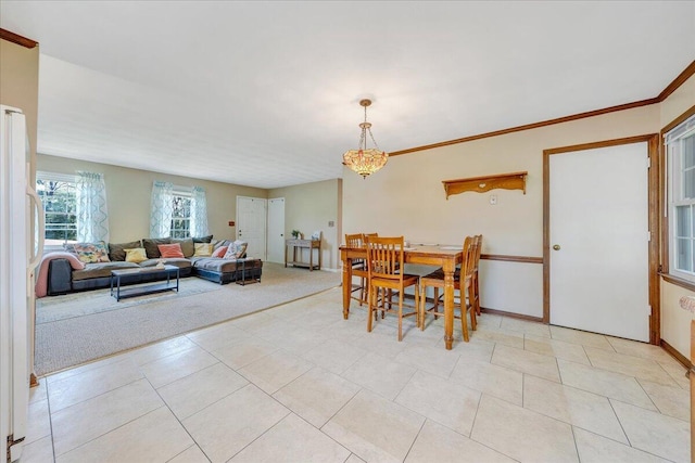 7073 Northway Dr, Roanoke, VA 24019 - dining room featuring a chandelier, light carpet, light tile patterned floors, and baseboards