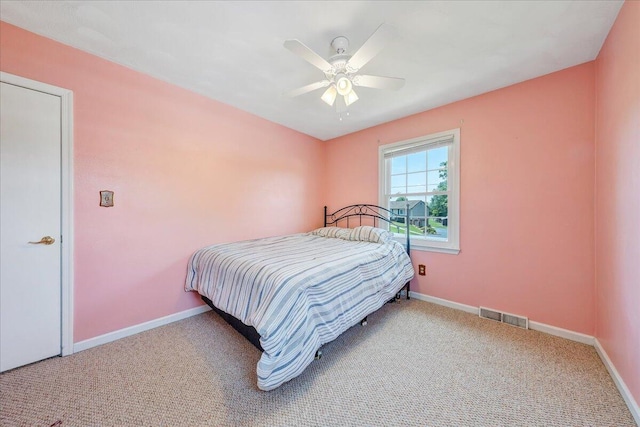 7073 Northway Dr, Roanoke, VA 24019 - carpeted bedroom featuring baseboards and a ceiling fan