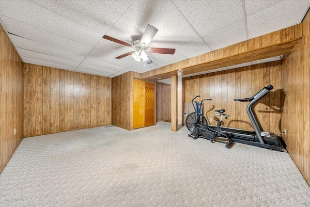 7073 Northway Dr, Roanoke, VA 24019 - exercise room featuring wood walls, carpet flooring, ceiling fan, and a paneled ceiling