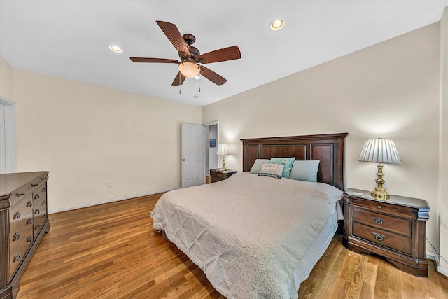 1309 W Pine Ridge Rd, Huddleston, VA 24104 - bedroom with wood finished floors, baseboards, ceiling fan, and recessed lighting
