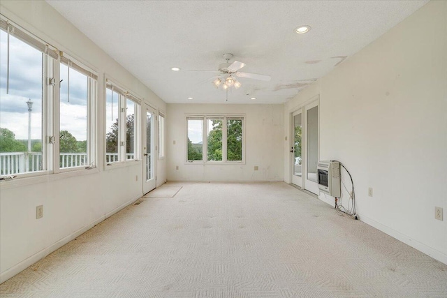 205 Park Shores Cir, Moneta, VA 24121 - unfurnished sunroom with recessed lighting, carpet floors, heating unit, and baseboards