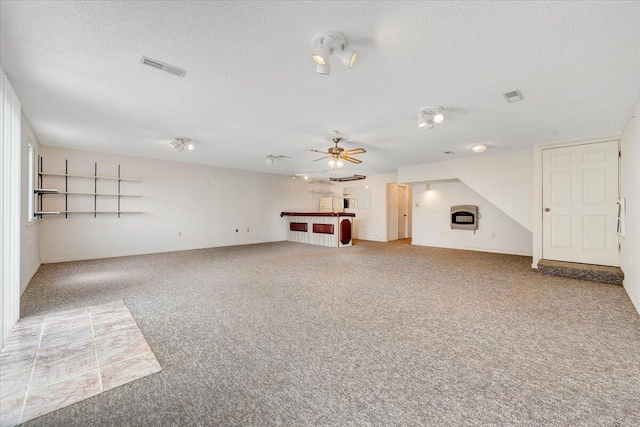 205 Park Shores Cir, Moneta, VA 24121 - unfurnished living room with carpet floors, a textured ceiling, and a ceiling fan