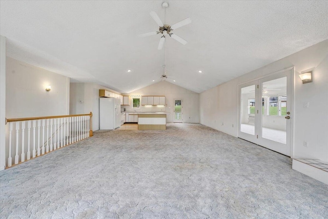 205 Park Shores Cir, Moneta, VA 24121 - unfurnished living room with a ceiling fan, lofted ceiling, and light colored carpet