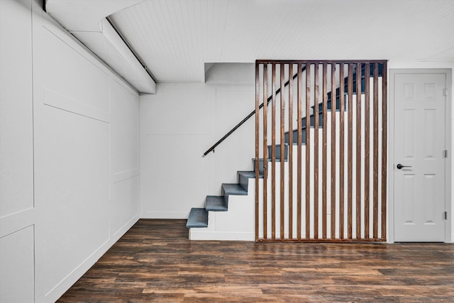 stairs with wood finished floors
