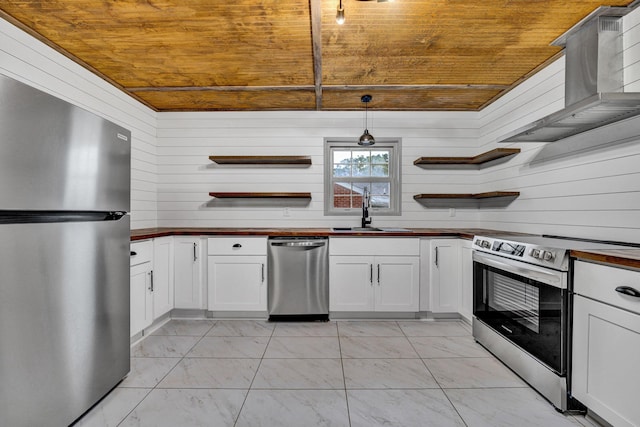 kitchen featuring appliances with stainless steel finishes, open shelves, wood ceiling, light marble finish flooring, and a sink