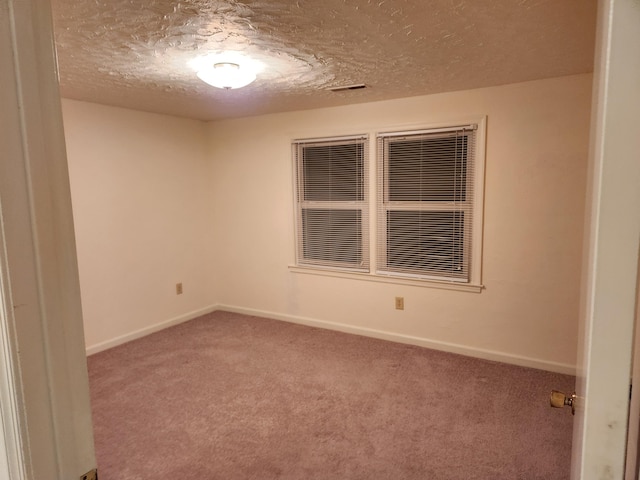 215 Overlook Rd, Vinton, VA 24179 - carpeted spare room with baseboards and a textured ceiling
