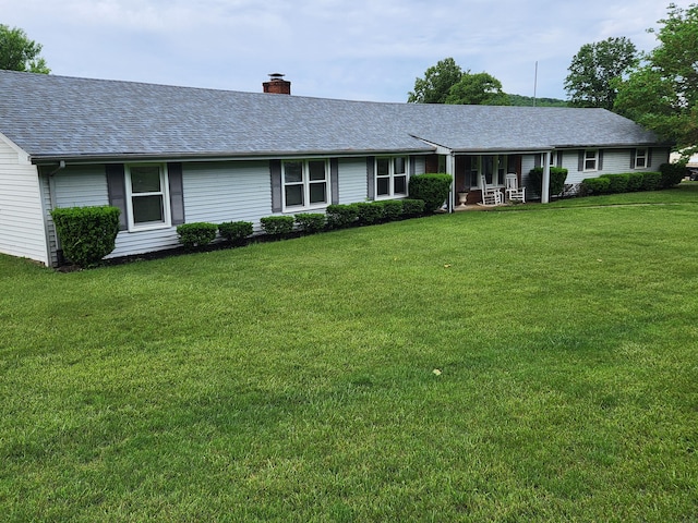 215 Overlook Rd, Vinton, VA 24179 - ranch-style home featuring a chimney, a front yard, and a shingled roof