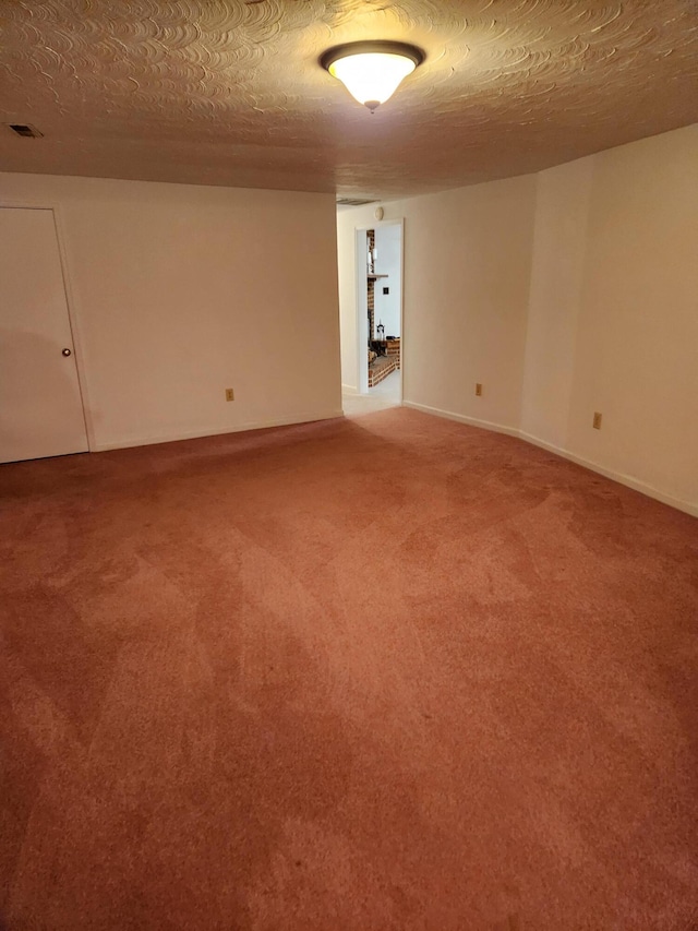 215 Overlook Rd, Vinton, VA 24179 - spare room with a textured ceiling, light carpet, and baseboards