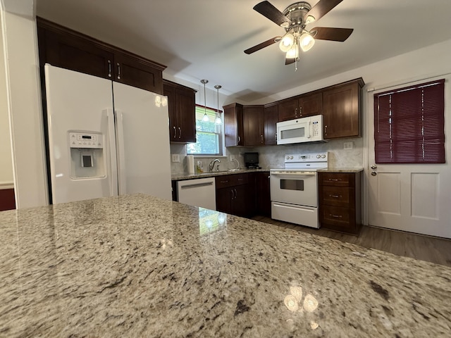 5265 Wipledale Ave, Roanoke, VA 24019 - kitchen featuring white appliances, light stone countertops, a sink, ceiling fan, and wood finished floors