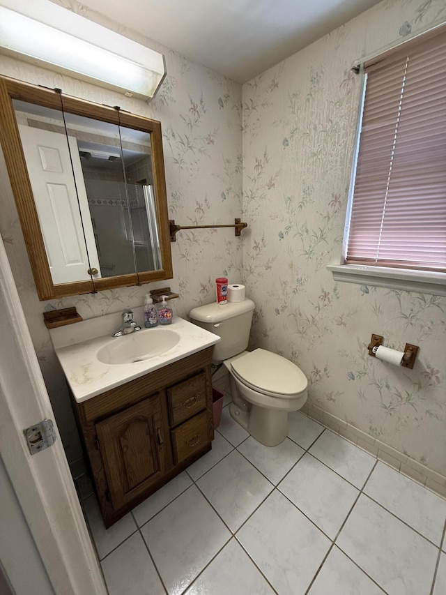 5265 Wipledale Ave, Roanoke, VA 24019 - bathroom with vanity, toilet, and tile patterned floors