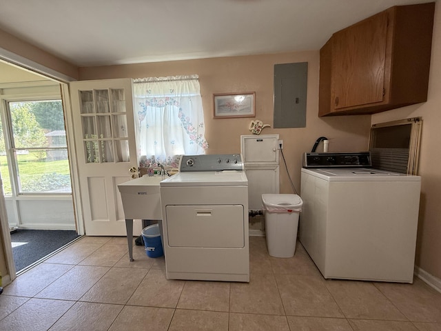 5265 Wipledale Ave, Roanoke, VA 24019 - laundry area with electric panel, cabinet space, washer and clothes dryer, and light tile patterned flooring
