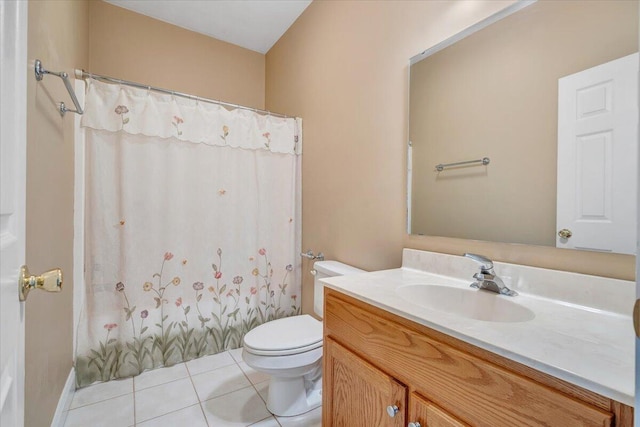 bathroom with toilet, tile patterned floors, vanity, and a shower with shower curtain
