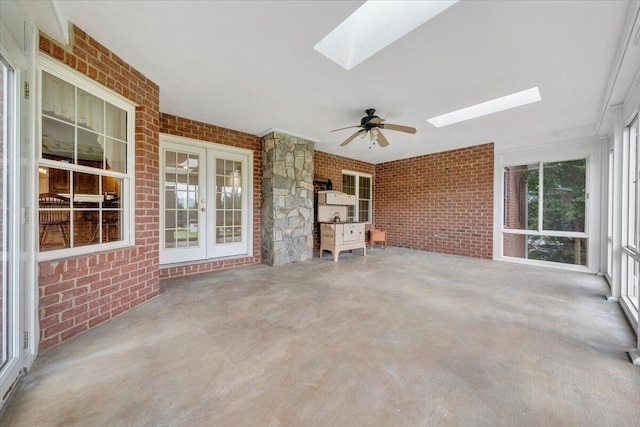 view of patio featuring french doors and a ceiling fan