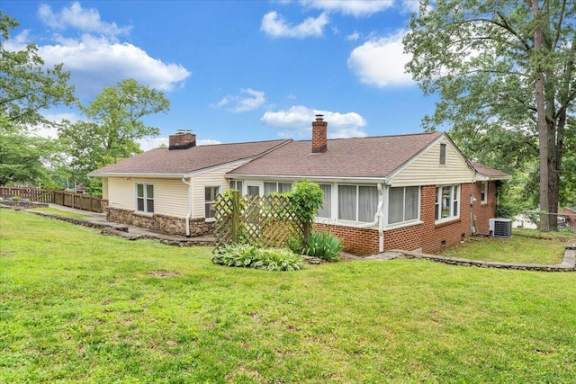 8209 Webster Dr, Roanoke, VA 24019 - rear view of house featuring a chimney, central AC, and brick siding