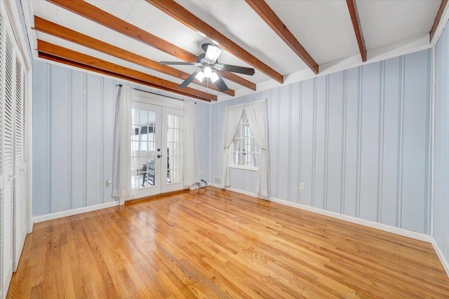 8209 Webster Dr, Roanoke, VA 24019 - unfurnished room featuring beam ceiling, french doors, a ceiling fan, and light wood-style floors