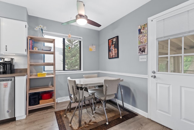 8574 Brubaker Dr, Roanoke, VA 24019 - dining area featuring baseboards, light wood finished floors, and a ceiling fan