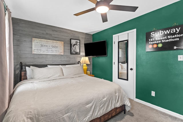 8574 Brubaker Dr, Roanoke, VA 24019 - carpeted bedroom with an accent wall, baseboards, and ceiling fan