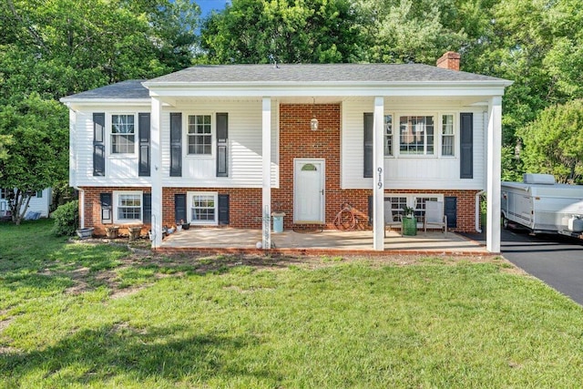 919 Halifax Cir, Vinton, VA 24179 - view of front of property with brick siding, a chimney, and a porch