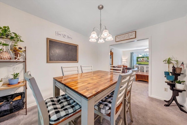 919 Halifax Cir, Vinton, VA 24179 - carpeted dining space featuring a chandelier and baseboards