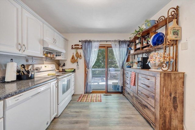 919 Halifax Cir, Vinton, VA 24179 - kitchen with white appliances, under cabinet range hood, white cabinetry, light wood-style flooring, and dark stone countertops