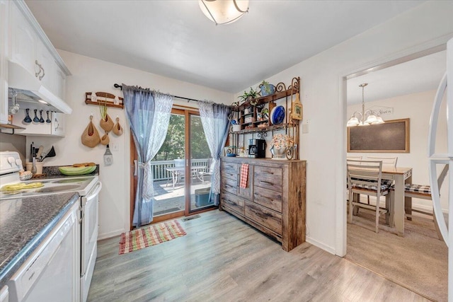 919 Halifax Cir, Vinton, VA 24179 - kitchen featuring white appliances, a chandelier, light wood-type flooring, dark countertops, and white cabinetry