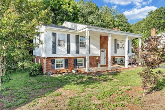 919 Halifax Cir, Vinton, VA 24179 - raised ranch with brick siding, a front lawn, and a porch