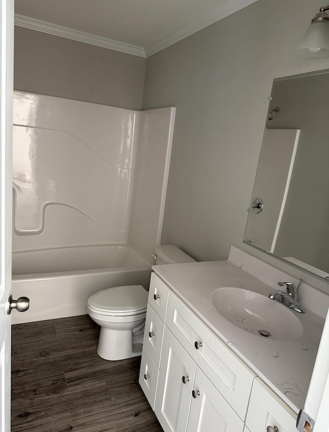 1800 Hardy Rd, Vinton, VA 24179 - bathroom featuring ornamental molding, toilet, vanity, wood finished floors, and  shower combination
