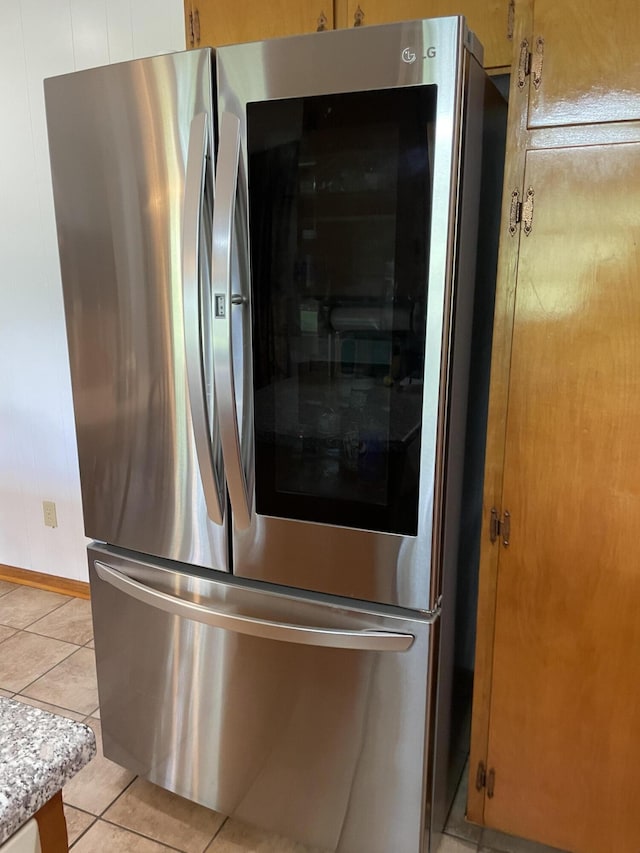 detailed view of smart refrigerator and light countertops