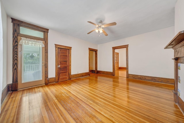 3759 Mill Iron Rd, Goodview, VA 24095 - spare room with light wood-style flooring, ceiling fan, and baseboards
