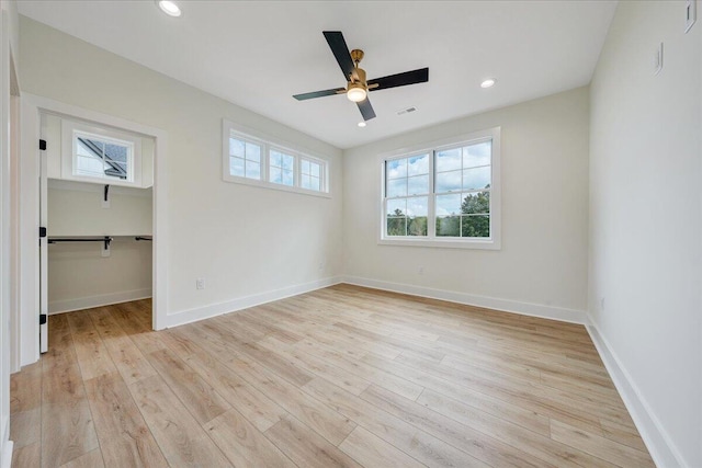 LOT243 Flagstick Ct, Penhook, VA 24137 - unfurnished bedroom featuring light wood-style floors, baseboards, a spacious closet, and recessed lighting
