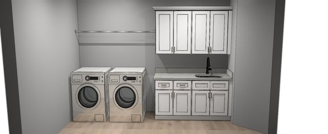 LOT243 Flagstick Ct, Penhook, VA 24137 - laundry area featuring cabinet space, washer and clothes dryer, and light wood finished floors