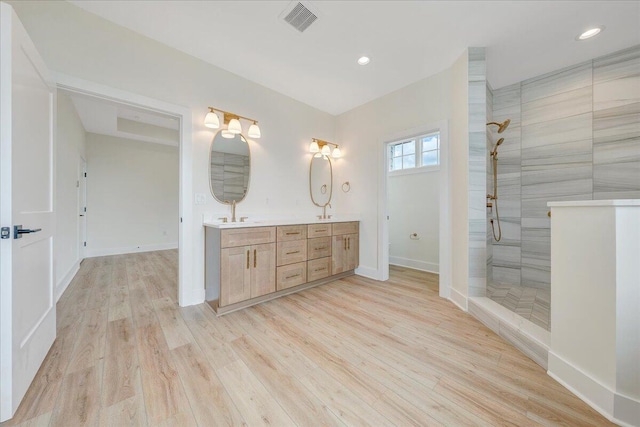 LOT243 Flagstick Ct, Penhook, VA 24137 - full bathroom featuring a walk in shower, double vanity, wood finished floors, and recessed lighting
