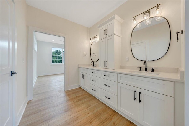 LOT243 Flagstick Ct, Penhook, VA 24137 - bathroom featuring double vanity and wood finished floors