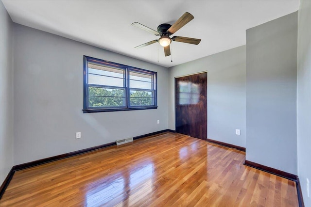 1104 Dolly Ann Dr, Covington, VA 24426 - unfurnished room featuring wood finished floors, baseboards, and a ceiling fan