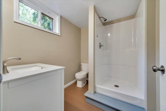 1104 Dolly Ann Dr, Covington, VA 24426 - bathroom with a shower, toilet, vanity, and baseboards