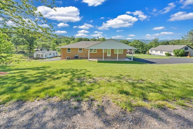 1104 Dolly Ann Dr, Covington, VA 24426 - view of front of home with a front yard and a patio