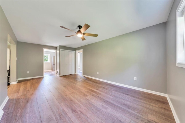 1104 Dolly Ann Dr, Covington, VA 24426 - spare room with a ceiling fan, wood finished floors, and baseboards