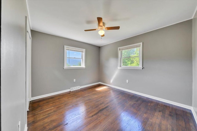 1104 Dolly Ann Dr, Covington, VA 24426 - empty room with healthy amount of natural light, wood finished floors, baseboards, and a ceiling fan